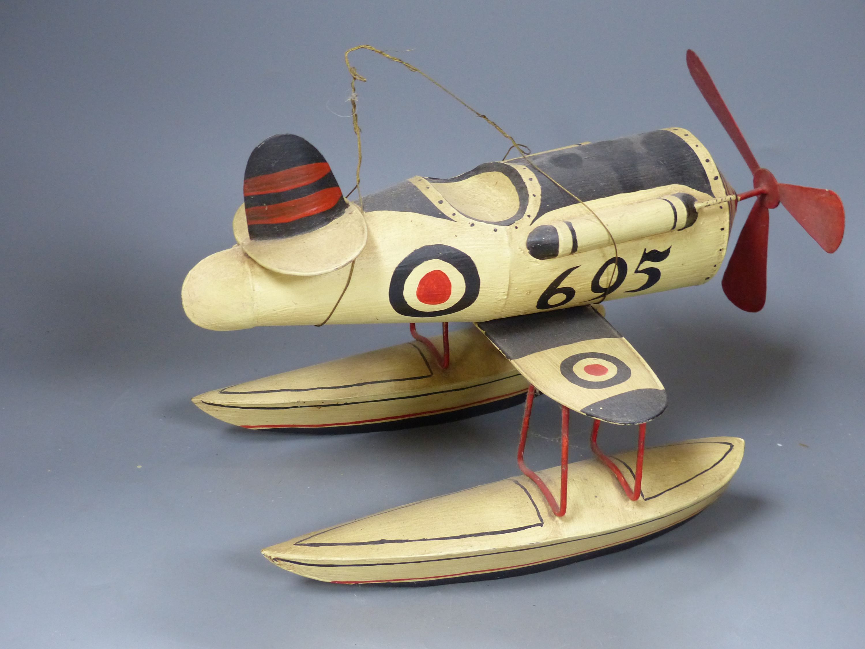 Model of a seaplane and one of a bi-plane